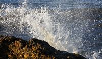 Costa del Sol - spray on a rocky formation